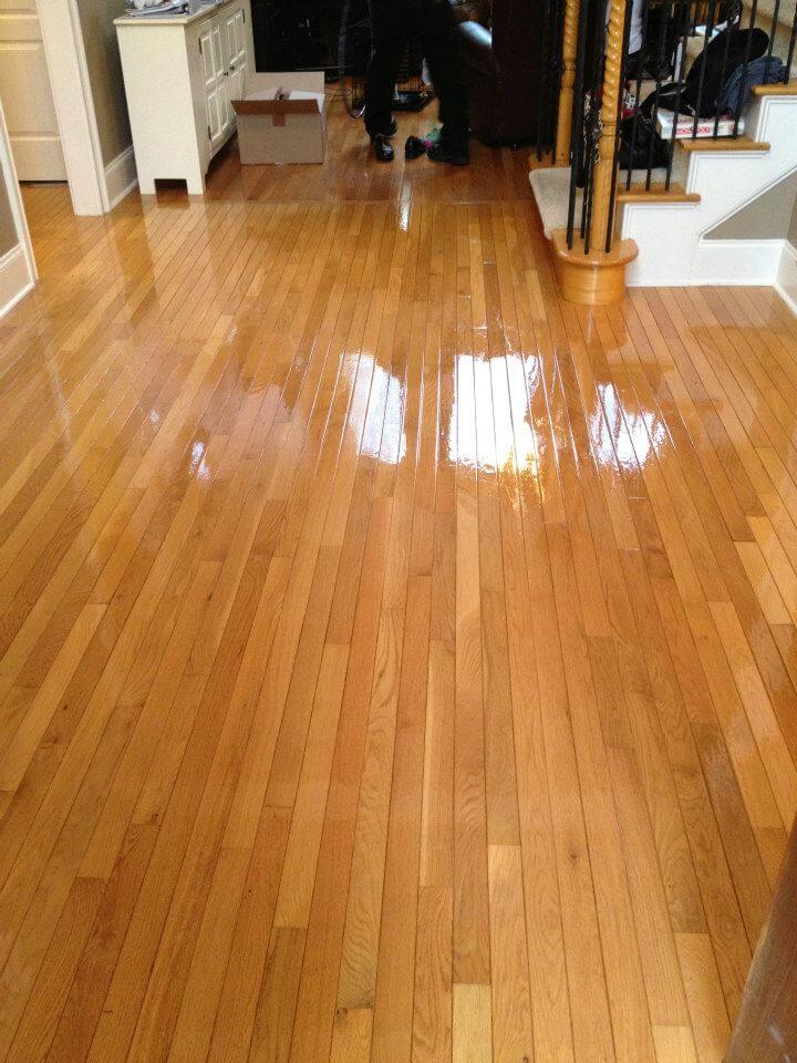 a resurfaced hardwood floor in an oceanside home.