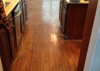 a floor in need of a new stain color