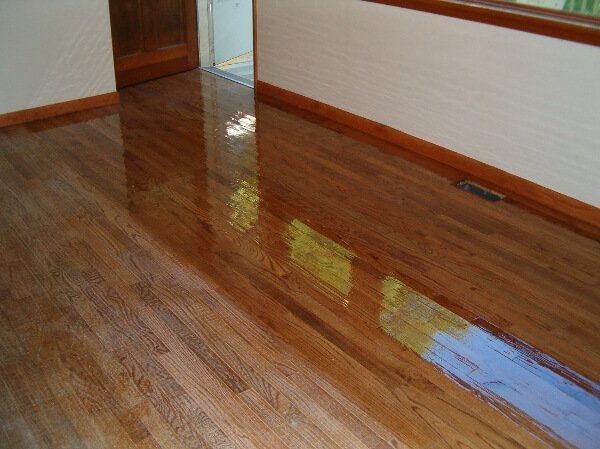 a floor in the process of being resurfaced in del mar, ca